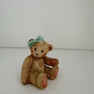 Adorable Brown Teddy Bear Figurine with Green Bow